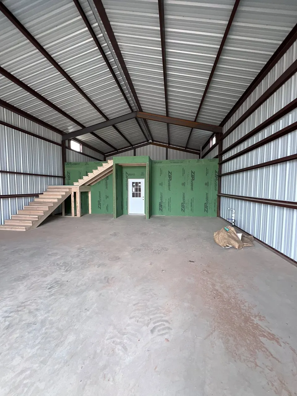 Interior mid-framing with ZIP System sheathing on a Homerun Fabrication industrial build